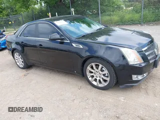 2009 Cadillac CTS AWD with VIN 1G6DT57VX90127569, listed as a IAAI auction lot 42680272 with 152,194 mi miles and . Bid and sale history available at DreamBid. Image 1.