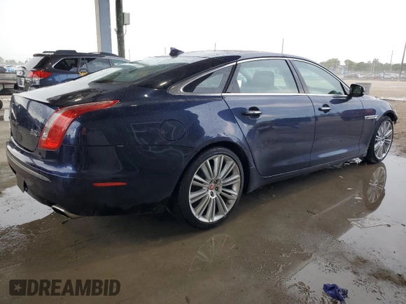 2015 Jaguar XJ Portfolio with VIN SAJWJ2GD2F8V90287, listed as a Copart auction lot 50291095 with 46,917 mi miles and Salvage title. Bid and sale history available at DreamBid. Image 3.