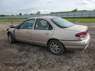 1999 Ford Contour SE z VIN 1FAFP6630XK193474, wystawiony jako Copart lot #71050124 z przebiegiem 136 858 mil mil oraz Szkody całkowita. Historia ofert i sprzedaży dostępna na DreamBid. Obrazek 2.