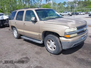 2005 Chevrolet Tahoe LT z VIN 1GNEC13T05J164155, wystawiony jako IAAI lot #42015852 z przebiegiem 216 683 mil mil oraz . Historia ofert i sprzedaży dostępna na DreamBid. Obrazek 1.