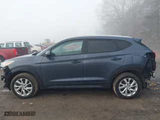 2019 Hyundai Tucson Value with VIN KM8J33A44KU995257, listed as a IAAI auction lot 41672206 with 63,090 mi miles. Bid and sale history available at carsss.com. Image 15.