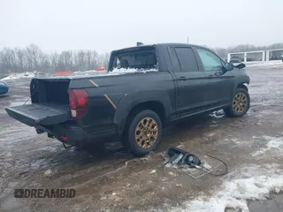 2021 Honda Ridgeline Sport with VIN 5FPYK3F12MB002877, listed as a IAAI auction lot 41576812 with 51,658 mi miles and . Bid and sale history available at DreamBid. Image 4.