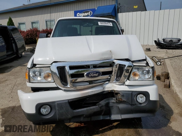 2011 Ford Ranger XLT with VIN 1FTKR4EEXBPA41322, listed as a Copart auction lot 60288475 with 87,940 mi miles and Salvage title. Bid and sale history available at DreamBid. Image 5.