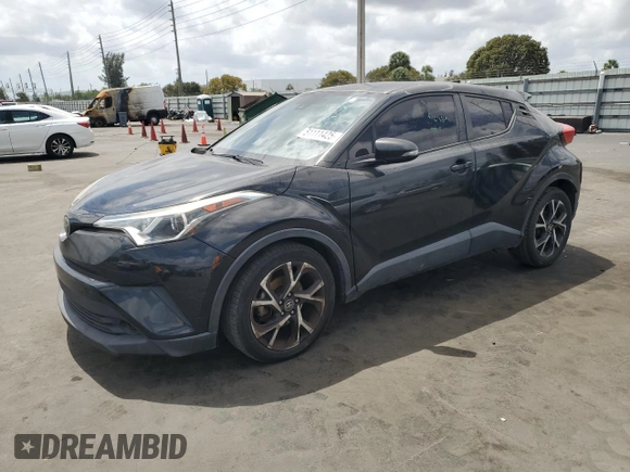 2018 Toyota C-HR XLE with VIN NMTKHMBX1JR015428, listed as a Copart auction lot 51111425 with 95,500 mi miles and Salvage Title. Bid and sale history available at carsss.com. Image 1.