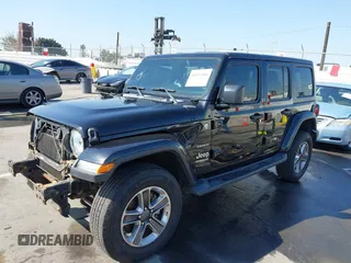 2020 Jeep Wrangler Unlimited Sahara with VIN 1C4HJXEN7LW230214, listed as a IAAI auction lot 41812466 with 59,004 mi miles. Bid and sale history available at carsss.com. Image 2.