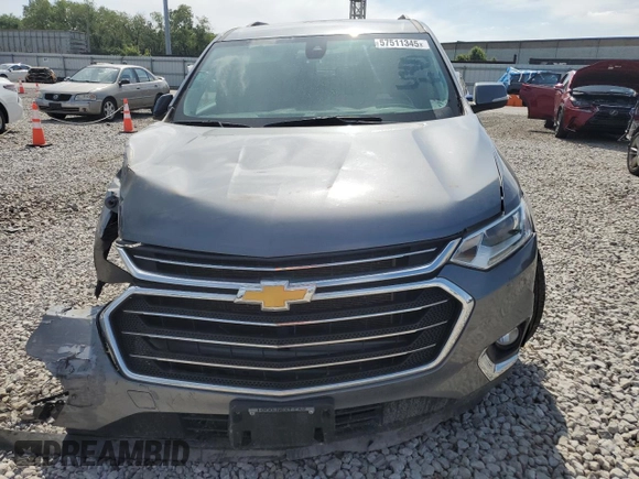 2021 Chevrolet Traverse LT Cloth z VIN 1GNEVGKW6MJ166824, wystawiony jako Copart lot #57511345 z przebiegiem Nie podano mil oraz Czysty tytuł • Clean title. Historia ofert i sprzedaży dostępna na DreamBid. Obrazek 5.