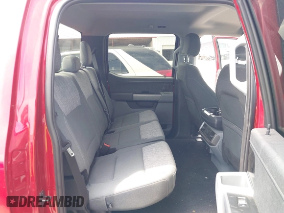 2023 Ford F-150 Lightning Pro with VIN 1FTVW1EL8PWG33656, listed as a IAAI auction lot 42260659 with 22,490 mi miles and . Bid and sale history available at DreamBid. Image 8.