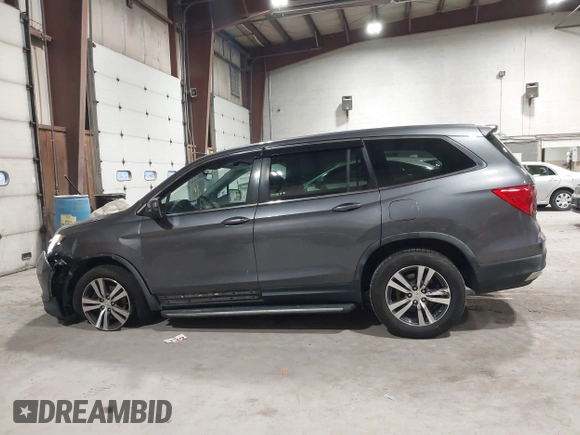 2016 Honda Pilot EX-L with VIN 5FNYF6H5XGB010230, listed as a IAAI auction lot 41858811 with 194,119 mi miles. Bid and sale history available at carsss.com. Image 14.