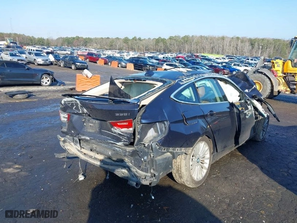 2014 BMW 3 Series Gran Turismo 335i xDrive with VIN WBA3X9C50ED153043, listed as a IAAI auction lot 41522427 with 186,028 mi miles. Bid and sale history available at carsss.com. Image 4.