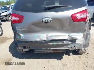 2013 Kia Sportage LX with VIN KNDPB3A21D7486860, listed as a IAAI auction lot 42049450 with 177,059 mi miles and . Bid and sale history available at DreamBid. Image 14.