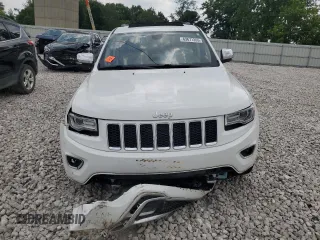 2015 Jeep Grand Cherokee Overland z VIN 1C4RJFCG8FC726437, wystawiony jako Copart lot #63671265 z przebiegiem 158 452 mil mil oraz Czysty tytuł • Clean title. Historia ofert i sprzedaży dostępna na DreamBid. Obrazek 5.