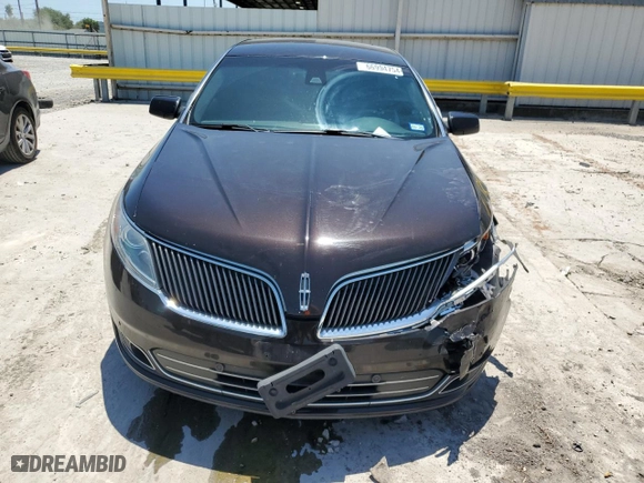 2013 Lincoln MKS with VIN 1LNHL9DK0DG615859, listed as a Copart auction lot 66994754 with 105,133 mi miles and Salvage Title. Bid and sale history available at carsss.com. Image 5.