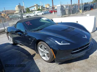 2014 Chevrolet Corvette 1LT with VIN 1G1YB3D79E5128150, listed as a IAAI auction lot 42533184 with 9,574 mi miles and . Bid and sale history available at DreamBid. Image 1.