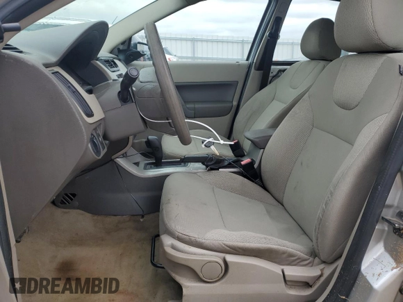 2009 Ford Focus S with VIN 1FAHP34N19W231625, listed as a Copart auction lot 52535085 with 126,487 mi miles and Non Repairable. Bid and sale history available at carsss.com. Image 7.