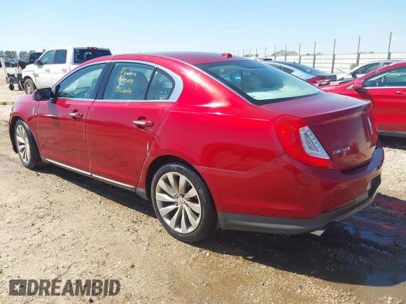2013 Lincoln MKS with VIN 1LNHL9DK2DG612977, listed as a IAAI auction lot 41762687 with 149,420 mi miles. Bid and sale history available at carsss.com. Image 3.