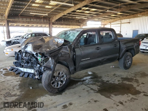 2018 Toyota Tacoma SR5 with VIN 3TMAZ5CN9JM075289, listed as a Copart auction lot 52409365 with 65,793 mi miles and Salvage Title. Bid and sale history available at DreamBid. Image 1.