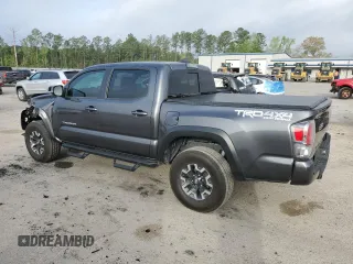 2021 Toyota Tacoma SR z VIN 3TMCZ5ANXMM433788, wystawiony jako Copart lot #51614785 z przebiegiem 58 157 mil mil oraz Czysty tytuł • Clean title. Historia ofert i sprzedaży dostępna na DreamBid. Obrazek 2.