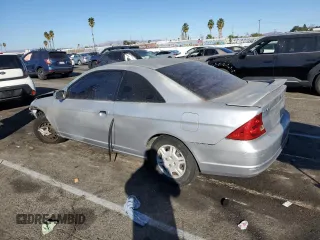 2001 Honda Civic LX with VIN 1HGEM21581L007005, listed as a Copart auction lot 80998594 with 0 mi miles and Salvage Title. Bid and sale history available at carsss.com. Image 2.