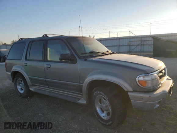 2001 Ford Explorer Eddie Bauer with VIN 1FMZU84P01UB51671, listed as a Copart auction lot 82465744 with 127,592 mi miles and Clean title. Bid and sale history available at DreamBid. Image 4.