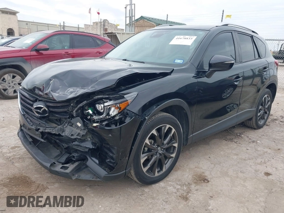 2016 Mazda CX-5 Grand Touring with VIN JM3KE2DY0G0651300, listed as a IAAI auction lot 41678833 with 98,790 mi miles. Bid and sale history available at carsss.com. Image 17.
