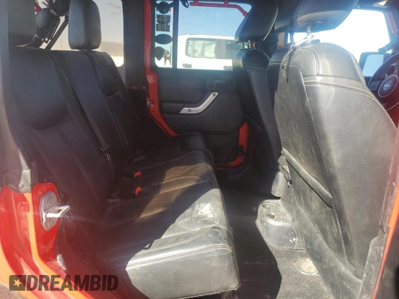 2016 Jeep Wrangler Unlimited Rubicon with VIN 1C4BJWFGXGL183011, listed as a Copart auction lot 42310535 with 165,227 mi miles and Salvage title. Bid and sale history available at DreamBid. Image 11.