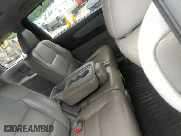 2012 Honda Odyssey Touring with VIN 5FNRL5H97CB066596, listed as a IAAI auction lot 42472935 with 217,182 mi miles and . Bid and sale history available at DreamBid. Image 8.