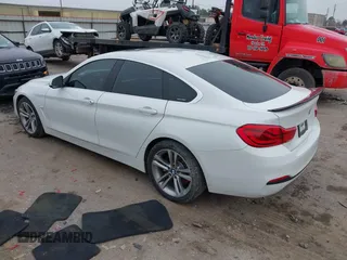 2018 BMW 4 Series 440i with VIN WBA4J5C56JBF07087, listed as a IAAI auction lot 41421921 with 61,601 mi miles and . Bid and sale history available at DreamBid. Image 3.