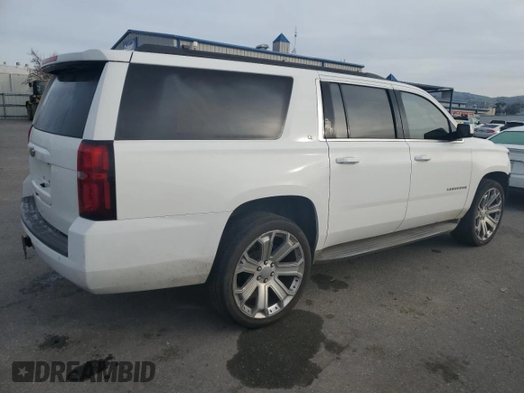 2015 Chevrolet Suburban LT with VIN 1GNSCJKC2FR601516, listed as a Copart auction lot 48480595 with 176,875 mi miles and Salvage title. Bid and sale history available at DreamBid. Image 3.
