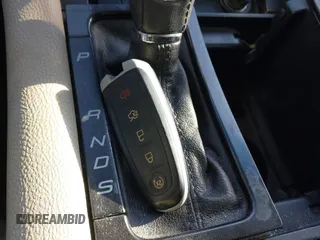 2015 Ford Taurus Limited с VIN 1FAHP2F85FG169704, выставлен на аукционе IAAI как лот 41152599 с пробегом 167 589 миль миль и . История ставок и продаж доступна на DreamBid. Изображение 11.