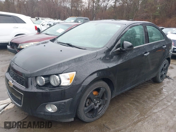 2016 Chevrolet Sonic LTZ z VIN 1G1JE5SB8G4143596, wystawiony jako IAAI lot #41874653 z przebiegiem 148 855 mil mil oraz . Historia ofert i sprzedaży dostępna na DreamBid. Obrazek 2.