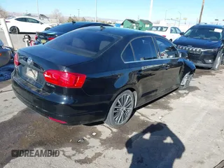 2012 Volkswagen Jetta Sedan SEL w/Sunroof with VIN 3VWLX7AJ1CM376990, listed as a IAAI auction lot 41206594 with 50,906 mi miles. Bid and sale history available at carsss.com. Image 4.