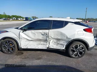 2021 Toyota C-HR LE with VIN NMTKHMBX0MR123981, listed as a IAAI auction lot 41273382 with 51,988 mi miles. Bid and sale history available at carsss.com. Image 14.