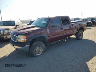 2002 GMC Sierra 2500HD SLE z VIN 1GTHK23U72F244476, wystawiony jako Copart lot #86332744 z przebiegiem Nie podano mil oraz Szkoda całkowita • Salvage title. Historia ofert i sprzedaży dostępna na DreamBid. Obrazek 1.