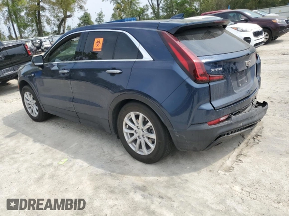 2022 Cadillac XT4 FWD Luxury z VIN 1GYAZAR47NF120348, wystawiony jako Copart lot #50187025 z przebiegiem 76 886 mil mil oraz Nie do naprawy • Non repairable. Historia ofert i sprzedaży dostępna na DreamBid. Obrazek 2.