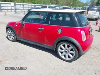 2006 MINI Hardtop S with VIN WMWRE33526TG99561, listed as a IAAI auction lot 42230639 with 202,113 mi miles and . Bid and sale history available at DreamBid. Image 3.