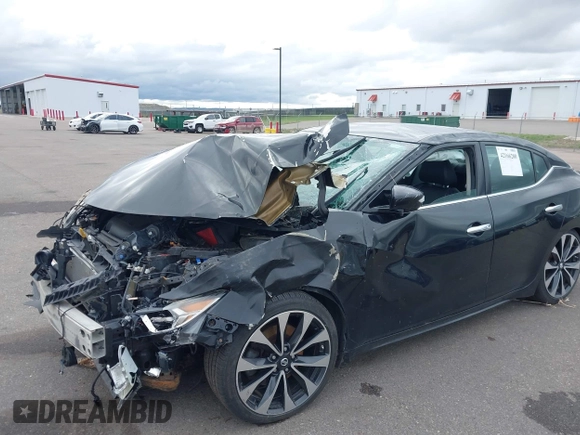 2016 Nissan Maxima SR z VIN 1N4AA6AP9GC386237, wystawiony jako IAAI lot #42166280 z przebiegiem 130 091 mil mil oraz . Historia ofert i sprzedaży dostępna na DreamBid. Obrazek 6.