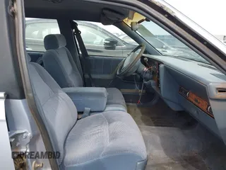 1995 Buick Century Special SJ with VIN 1G4AG55M8S6409397, listed as a IAAI auction lot 41872633 with 84,308 mi miles and . Bid and sale history available at DreamBid. Image 5.