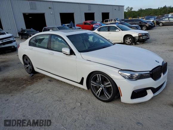 2018 BMW 7 Series 740i with VIN WBA7E2C55JG742869, listed as a Copart auction lot 52317095 with 0 mi miles and Salvage Title. Bid and sale history available at carsss.com. Image 4.