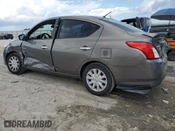 2016 Nissan Versa S with VIN 3N1CN7AP4GL808905, listed as a Copart auction lot 58518875 with 115,679 mi miles and Salvage title. Bid and sale history available at DreamBid. Image 2.