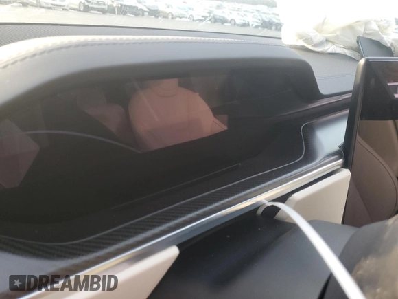 2022 Tesla Model S Plaid with VIN 5YJSA1E61NF488716, listed as a Copart auction lot 45325785 with Not provided miles and Salvage title. Bid and sale history available at DreamBid. Image 9.