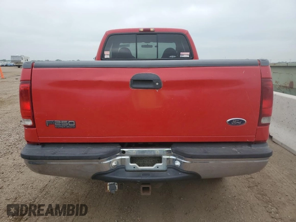 2000 Ford F-250 XL с VIN 1FTNX21F0YEC22018, выставлен на аукционе Copart как лот 65368895 с пробегом 194 738 миль миль и Списание • Salvage title. История ставок и продаж доступна на DreamBid. Изображение 6.