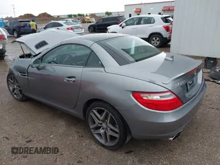 2014 Mercedes-Benz SLK 250 with VIN WDDPK4HA6EF084283, listed as a IAAI auction lot 41927893 with 32,143 mi miles and . Bid and sale history available at DreamBid. Image 3.