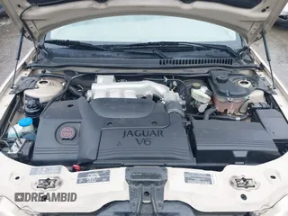 2003 Jaguar X-Type 2.5L Manual z VIN SAJEA51D53XC94089, wystawiony jako IAAI lot #42370566 z przebiegiem 81 687 mil mil oraz . Historia ofert i sprzedaży dostępna na DreamBid. Obrazek 10.