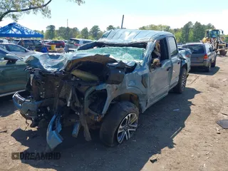 2023 Ford F-150 XL with VIN 1FTFW1E53PKD99214, listed as a IAAI auction lot 42211755 with 31 mi miles and . Bid and sale history available at DreamBid. Image 17.