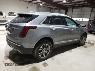 2023 Cadillac XT5 AWD Premium Luxury with VIN 1GYKNDRS5PZ221261, listed as a Copart auction lot 52779565 with 7,098 mi miles and Salvage Title. Bid and sale history available at DreamBid. Image 3.