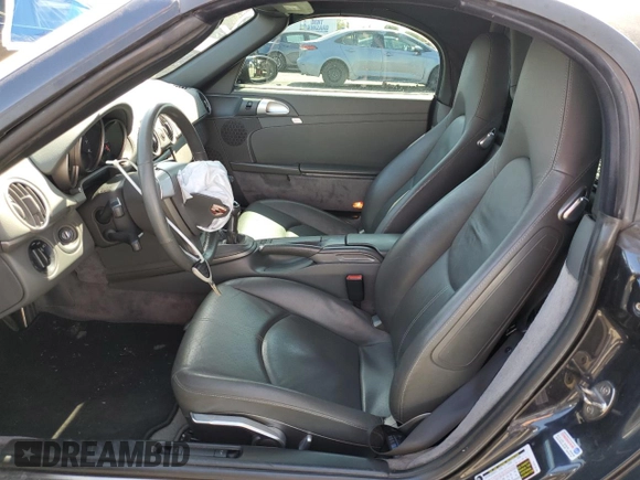 2006 Porsche Boxster z VIN WP0CA29876U712814, wystawiony jako Copart lot #49630945 z przebiegiem 66 044 mil mil oraz Szkoda całkowita • Salvage title. Historia ofert i sprzedaży dostępna na DreamBid. Obrazek 7.