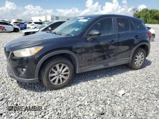 2014 Mazda CX-5 Touring z VIN JM3KE2CY8E0326988, wystawiony jako Copart lot #60473715 z przebiegiem 231 055 mil mil oraz Czysty tytuł • Clean title. Historia ofert i sprzedaży dostępna na DreamBid. Obrazek 1.
