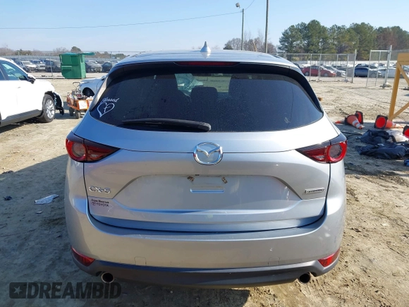 2020 Mazda CX-5 Touring with VIN JM3KFACM8L0727393, listed as a IAAI auction lot 41492627 with 91,521 mi miles. Bid and sale history available at carsss.com. Image 16.