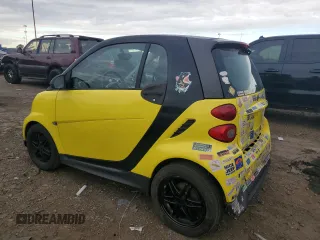 2013 Smart fortwo Pure z VIN WMEEJ3BA2DK663432, wystawiony jako Copart lot #63203755 z przebiegiem 79 786 mil mil oraz Czysty tytuł • Clean title. Historia ofert i sprzedaży dostępna na DreamBid. Obrazek 2.