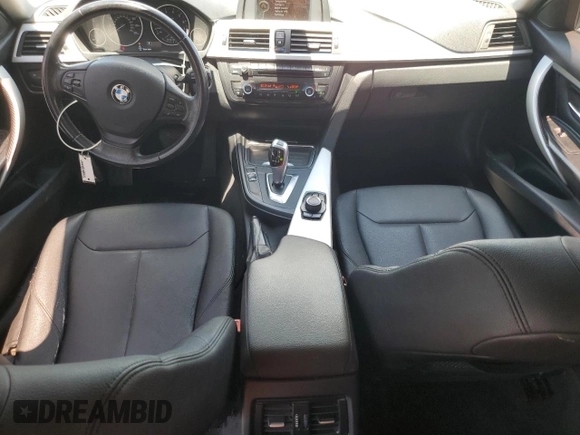 2013 BMW 3 Series 328i with VIN WBA3A5C57DF602652, listed as a Copart auction lot 60874345 with 147,214 mi miles and Salvage title. Bid and sale history available at DreamBid. Image 8.